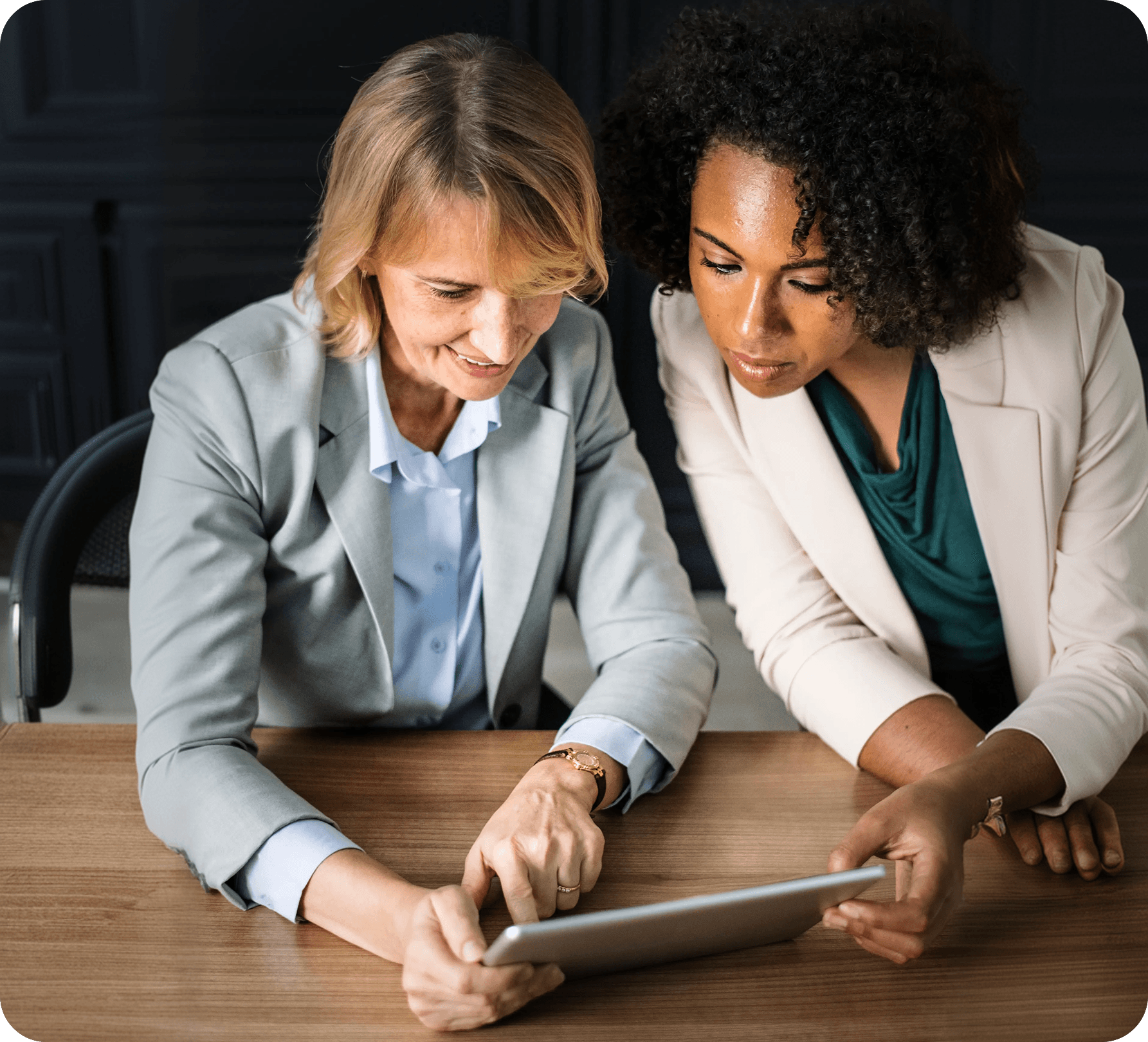 Two colleagues reviewing student progress together